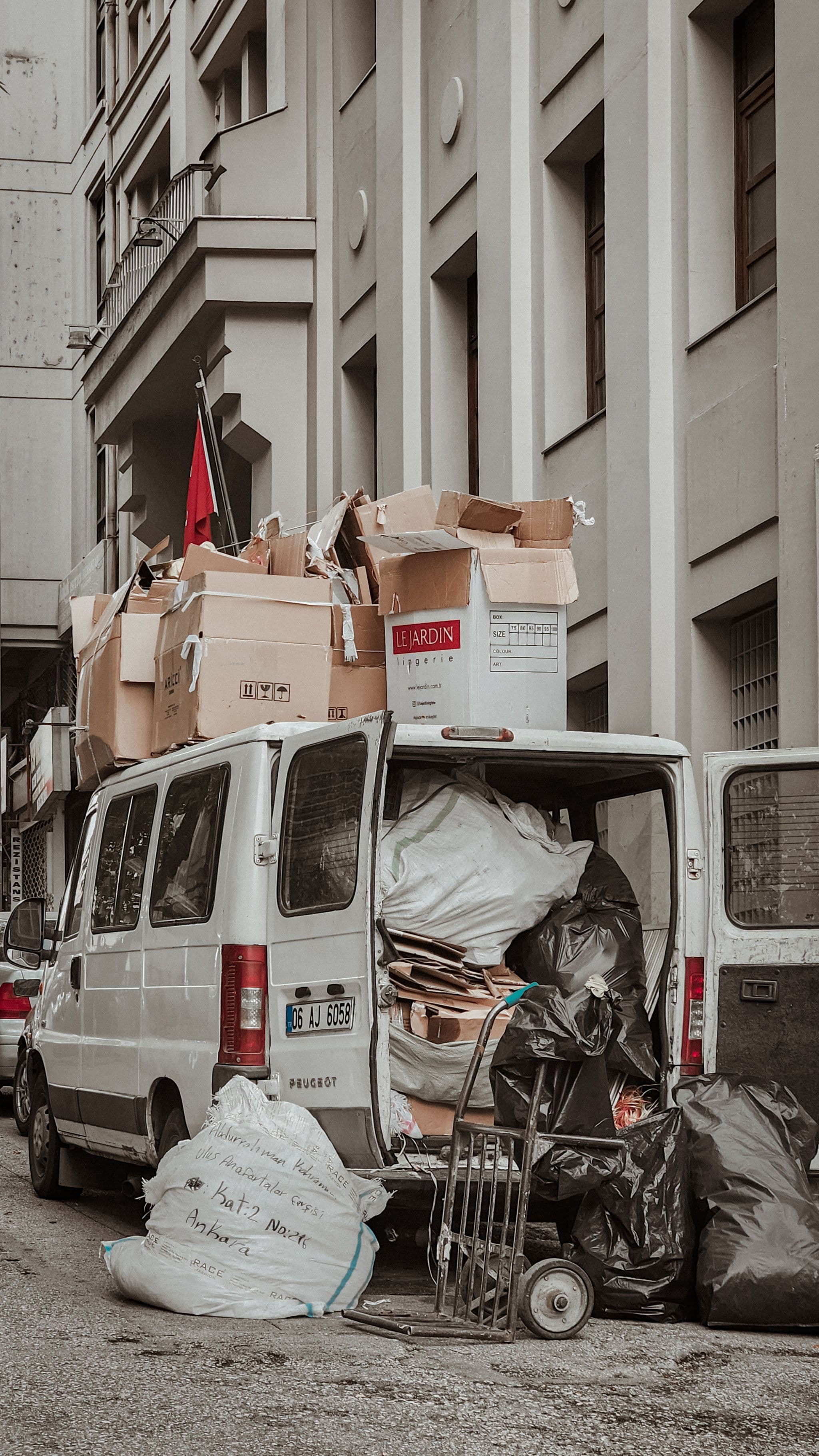Crew loading a junk removal truck